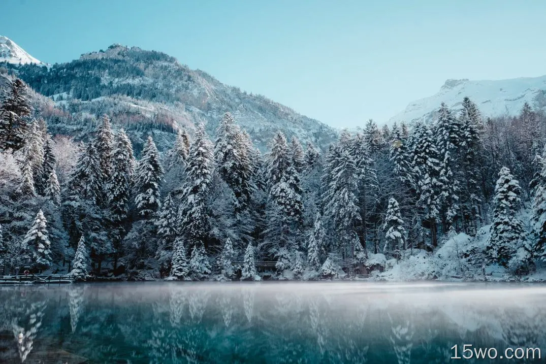 瑞士冬天反射5k壁纸